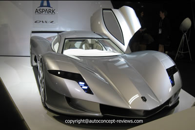 The Japanese Automotive Engineering Company ASPARK exhibited its Limited Edition OWL Premium Electric sports car proposed at 3,1 million Euros for 50 units. The standing start 0-100 km/h is announced for 1,99 seconds with road legal tires. The top speed is claimed at 280 km/h while the drive range is one charge is specified for 300 km. Four motors, one per wheel, combine a total power of 860 kW(1.150 bhp) for a dry weight of 1460 kg.